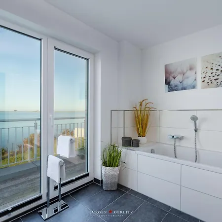 Ostseewind: Wasserblick, Finnische Sauna, Whirlwanne, Kamin, 2 Parkplaetze 度假居