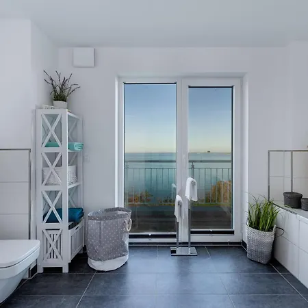 Ostseewind: Wasserblick, Finnische Sauna, Whirlwanne, Kamin, 2 Parkplaetze * Olpenæs