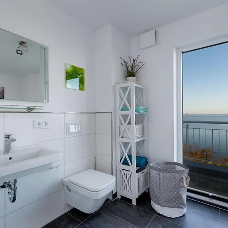 Ostseewind: Wasserblick, Finnische Sauna, Whirlwanne, Kamin, 2 Parkplaetze * Olpenæs